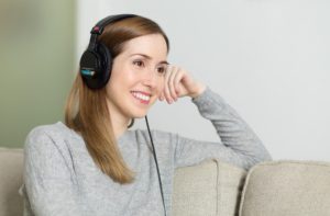 woman listening to regtalks podcast